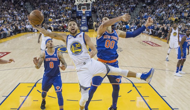 January 23, 2018; Oakland, CA, USA; Golden State Warriors guard Stephen Curry (30) shoots the basketball against New York Knicks center Enes Kanter (00) during the second half at Oracle Arena. The Warriors defeated the Knicks 123-112. Photo Credit: Kyle Terada-USA TODAY Sports