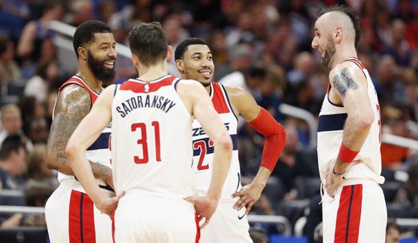 Feb 3, 2018; Orlando, FL, USA; Washington Wizards forward Markieff Morris (5), forward Tomas Satoransky (31),forward Otto Porter Jr. (22) and center Marcin Gortat (13) talk against the Orlando Magic during the second half at Amway Center. Photo Credit: Kim Klement-USA TODAY Sports