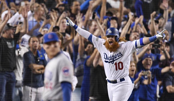 Oct 15, 2017; Los Angeles, CA, USA; Los Angeles Dodgers third baseman Justin Turner (10) runs home after hitting a three RBI home run against the Chicago Cubs in the ninth inning during game two of the 2017 NLCS playoff baseball series at Dodger Stadium. Photo Credit: Robert Hanashiro-USA TODAY Sports