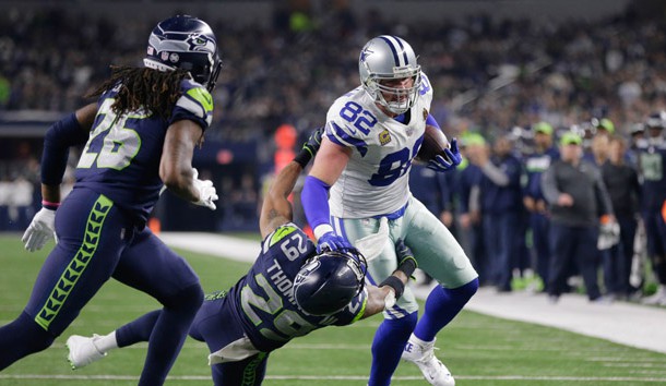 Dec 24, 2017; Arlington, TX, USA; Dallas Cowboys tight end Jason Witten (82) runs over Seattle Seahawks free safety Earl Thomas (29) at AT&T Stadium. Seattle won 21-12. Photo Credit: Erich Schlegel-USA TODAY Sports