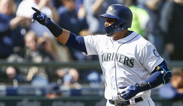 Mar 31, 2018; Seattle, WA, USA; Seattle Mariners designated hitter Nelson Cruz (23) points to the stands after hitting a two-run homer against the Cleveland Indians during the sixth inning at Safeco Field. Photo Credit: Joe Nicholson-USA TODAY Sports