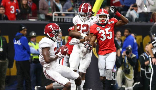Jan 8, 2018; Atlanta, GA, USA; Alabama Crimson Tide wide receiver Calvin Ridley (3) catches a touchdown pass against Georgia Bulldogs defensive back Aaron Davis (35) during the fourth quarter in the 2018 CFP national championship college football game at Mercedes-Benz Stadium. Photo Credit: Mark J. Rebilas-USA TODAY Sports
