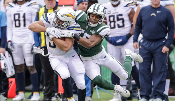 Dec 24, 2017; East Rutherford, NJ, USA; Los Angeles Chargers tight end Sean McGrath (84) is tackled by New York Jets inside linebacker Darron Lee (58) during the first half at MetLife Stadium. Photo Credit: Vincent Carchietta-USA TODAY Sports