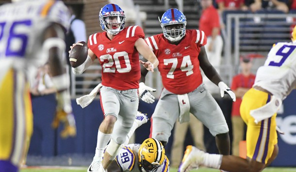 Oct 21, 2017; Oxford, MS, USA; Mississippi Rebels quarterback Shea Patterson (20) moves out of the pocket against the LSU Tigers during the second quarter at Vaught-Hemingway Stadium. Photo Credit: Matt Bush-USA TODAY Sports