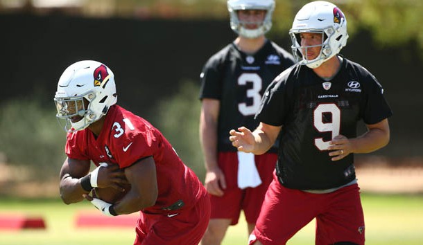 May 15, 2018; Tempe, AZ, USA; Arizona Cardinals quarterback Sam Bradford hands the ball to running back David Johnson during organized team activities at the Arizona Cardinals Training Facility. Photo Credit: Rob Schumacher/Arizona Republic via USA TODAY Sports
