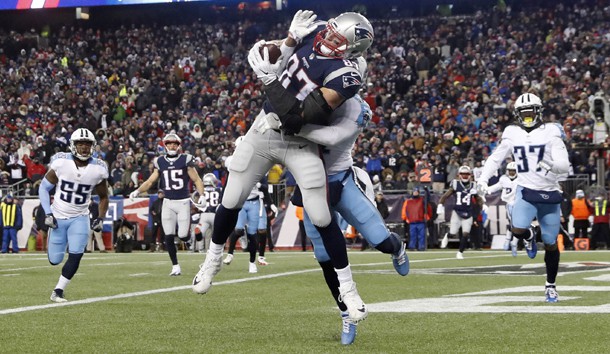 Jan 13, 2018; Foxborough, MA, USA; New England Patriots tight end Rob Gronkowski (87) makes a touchdown catch against Tennessee Titans free safety Kevin Byard (31) during the fourth quarter in the AFC Divisional playoff game at Gillette Stadium. Photo Credit: Winslow Townson-USA TODAY Sports