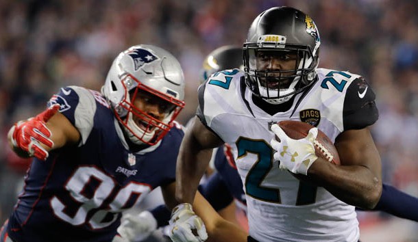 Jan 21, 2018; Foxborough, MA, USA; Jacksonville Jaguars running back Leonard Fournette (27) runs the ball against the New England Patriots in the AFC Championship Game at Gillette Stadium. Photo Credit: David Butler II-USA TODAY Sports