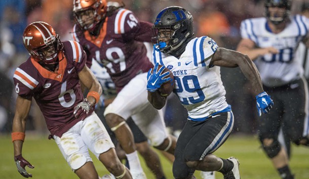 Oct 28, 2017; Blacksburg, VA, USA; Duke Blue Devils running back Shaun Wilson (29) runs the ball in the second period as Virginia Tech Hokies defensive back Mook reynolds chases play at Lane Stadium. Photo Credit: Lee Luther Jr.-USA TODAY Sports