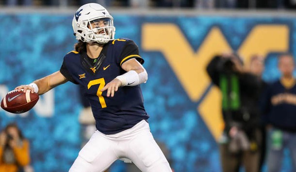 Nov 4, 2017; Morgantown, WV, USA; West Virginia Mountaineers quarterback Will Grier (7) throws a pass during the fourth quarter against the Iowa State Cyclones at Milan Puskar Stadium. Mandatory Credit: Ben Queen-USA TODAY Sports