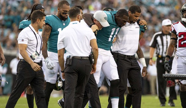 Aug 25, 2018; Jacksonville, FL, USA; Jacksonville Jaguars wide receiver Marqise Lee (11) is helped to a cart after suffering an apparent injury during the first half against the Atlanta Falcons at TIAA Bank Field. Photo Credit: Douglas DeFelice-USA TODAY Sports