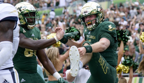 Sep 8, 2018; Tampa, FL, USA; South Florida quarterback Blake Barnett (11) celebrates his touchdown with his teammates during the second half against the Georgia Tech Yellow Jackets at Raymond James Stadium. Photo Credit: Douglas DeFelice-USA TODAY Sports