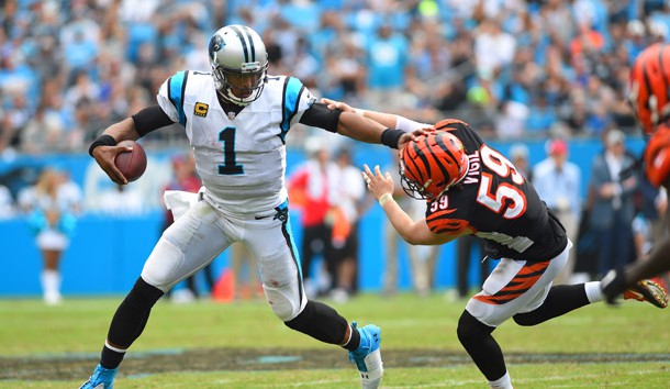 Sep 23, 2018; Charlotte, NC, USA; Carolina Panthers quarterback Cam Newton (1) with the ball as Cincinnati Bengals linebacker Nick Vigil (59) defends in the fourth quarter at Bank of America Stadium. Photo Credit: Bob Donnan-USA TODAY Sports