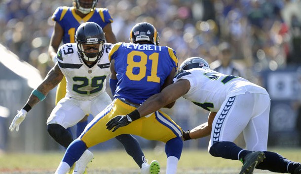 October 8, 2017; Los Angeles, CA, USA; Los Angeles Rams tight end Gerald Everett (81) is brought down by Seattle Seahawks middle linebacker Bobby Wagner (54) and free safety Earl Thomas (29) during the second half at the Los Angeles Memorial Coliseum. Photo Credit: Gary A. Vasquez-USA TODAY Sports