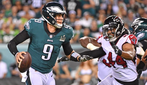 Sep 6, 2018; Philadelphia, PA, USA; Philadelphia Eagles quarterback Nick Foles (9) rolls away from pressure by Atlanta Falcons linebacker Vic Beasley (44) during the third quarter at Lincoln Financial Field. Photo Credit: Eric Hartline-USA TODAY Sports