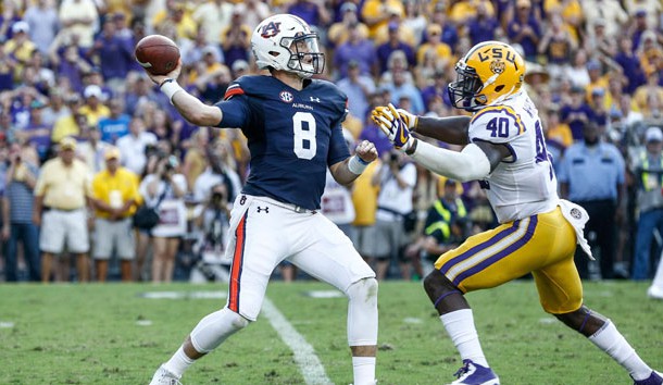 Auburn Tigers quarterback Jarrett Stidham (8) is hit by LSU Tigers linebacker Devin White (40) as he throws during the second half of a game at Tiger Stadium. LSU defeated Auburn 27-23 last season in Baton Rouge.. Photo Credit: Derick E. Hingle-USA TODAY Sports
