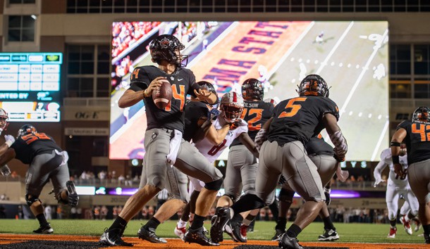 Sep 8, 2018; Stillwater, OK, USA; Oklahoma State Cowboys quarterback Taylor Cornelius (14) looks to pass against the South Alabama Jaguars during the first half at Boone Pickens Stadium. Photo Credit: Rob Ferguson-USA TODAY Sports