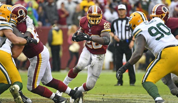 Sep 23, 2018; Landover, MD, USA; Washington Redskins running back Adrian Peterson (26) carries the ball against the Green Bay Packers during the second half at FedEx Field. Photo Credit: Brad Mills-USA TODAY Sports