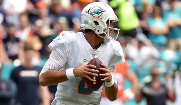 Oct 14, 2018; Miami Gardens, FL, USA; Miami Dolphins quarterback Brock Osweiler (8) throws a pass against the Chicago Bears during the first half at Hard Rock Stadium. Photo Credit: Steve Mitchell-USA TODAY Sports