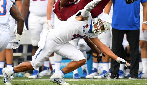 Sep 1, 2018; Troy, AL, USA; Troy Trojans cornerback Marcus Jones (8) is upended by Boise State Broncos safety DeAndre Pierce (4) after a kickoff return during the first half at Veterans Memorial Stadium. Photo Credit: Christopher Hanewinckel-USA TODAY Sports