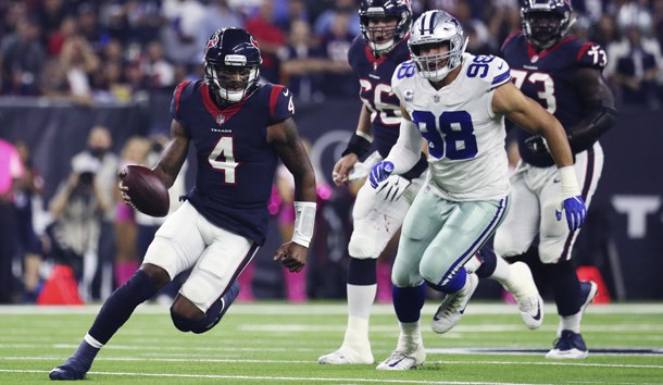 Oct 7, 2018; Houston, TX, USA; Houston Texans quarterback Deshaun Watson (4) runs past Dallas Cowboys defensive end Tyrone Crawford (98) during the first quarter at NRG Stadium. Photo Credit: Kevin Jairaj-USA TODAY Sports