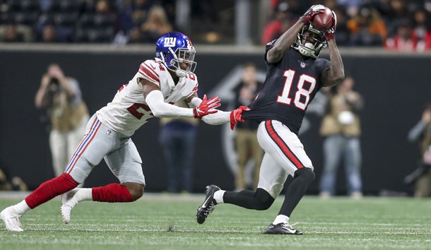 Oct 22, 2018; Atlanta, GA, USA; Atlanta Falcons wide receiver Calvin Ridley (18) catches a pass past New York Giants cornerback Eli Apple (24) in the fourth quarter at Mercedes-Benz Stadium. Photo Credit: Brett Davis-USA TODAY Sports