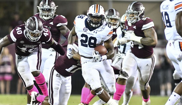 Oct 6, 2018; Starkville, MS, USA; Auburn Tigers running back JaTarvious Whitlow (28) runs the ball against the Mississippi State Bulldogs during the third quarter at Davis Wade Stadium. Photo Credit: Matt Bush-USA TODAY Sports