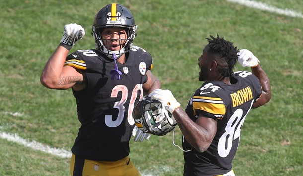 Oct 7, 2018; Pittsburgh, PA, USA; Pittsburgh Steelers running back James Conner (30) celebrates his touchdown with wide receiver Antonio Brown (84) against the Atlanta Falcons during the third quarter at Heinz Field. The Steelers won 41-17. Photo Credit: Charles LeClaire-USA TODAY Sports