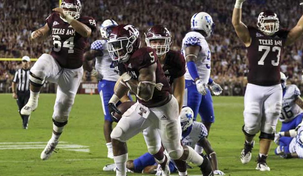 Oct 6, 2018; College Station, TX, USA; Texas A&M Aggies running back Trayveon Williams (5) celebrates after scoring on a game winning touchdown in overtime against the Kentucky Wildcats at Kyle Field. Photo Credit: John Glaser-USA TODAY Sports