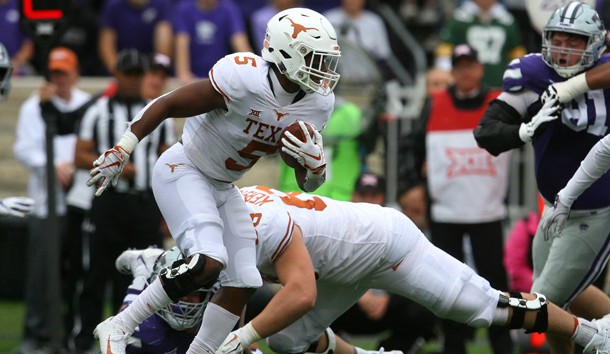 Sep 29, 2018; Manhattan, KS, USA; Texas Longhorns running back Tre Watson (5) looks for room to run during the first quarter against the Kansas State Wildcats at Bill Snyder Family Stadium. Photo Credit: Scott Sewell-USA TODAY Sports