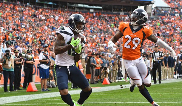 Sep 9, 2018; Denver, CO, USA; Seattle Seahawks wide receiver Brandon Marshall (15) pulls in a touchdown in front of Denver Broncos cornerback Bradley Roby (29) in the fourth quarter at Broncos Stadium at Mile High. Photo Credit: Ron Chenoy-USA TODAY Sports