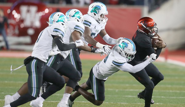Nov 15, 2018; Houston, TX, USA; Houston Cougars quarterback D'Eriq King (4) is tackled by Tulane Green Wave linebacker Marvin Moody (28) in the second quarter at TDECU Stadium. Photo Credit: Thomas B. Shea-USA TODAY Sports