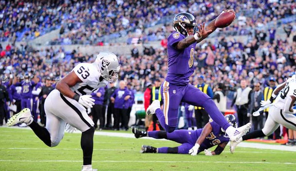 Nov 25, 2018; Baltimore, MD, USA; Baltimore Ravens quarterback Lamar Jackson (8) runs for a touchdown in the third quarter against the Oakland Raiders at M&T Bank Stadium. Photo Credit: Evan Habeeb-USA TODAY Sports