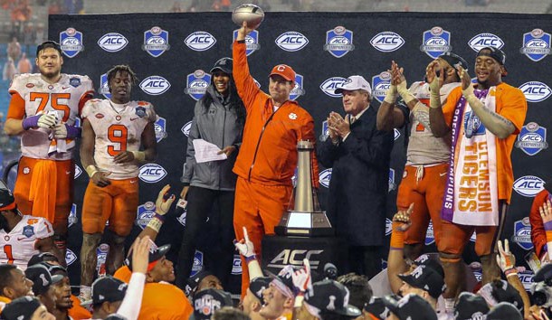 Dec 1, 2018; Charlotte, NC, USA; Clemson Tigers head coach Dabo Swinney holds up the ACC Championship trophy after defeating the Pittsburgh Panthers in the ACC championship game at Bank of America Stadium. Photo Credit: Jim Dedmon-USA TODAY Sports