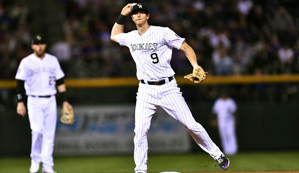 Sep 24, 2018; Denver, CO, USA; Colorado Rockies second baseman DJ LeMahieu (9) throws to first base in the fifth inning against the Philadelphia Phillies at Coors Field. Photo Credit: Ron Chenoy-USA TODAY Sports