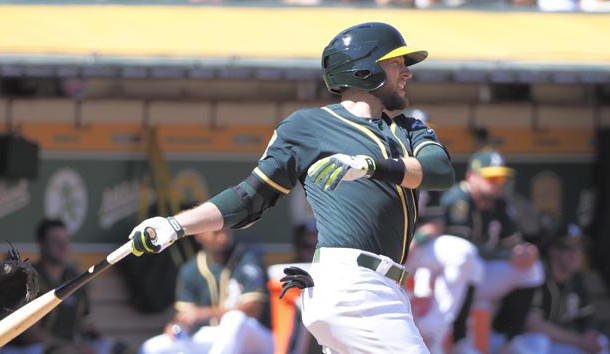 basSep 20, 2018; Oakland, CA, USA; Oakland Athletics second baseman Jed Lowrie (8) hits an RBI single against the Los Angeles Angels during the fourth inning at Oakland Coliseum. Photo Credit: Kelley L Cox-USA TODAY Sports