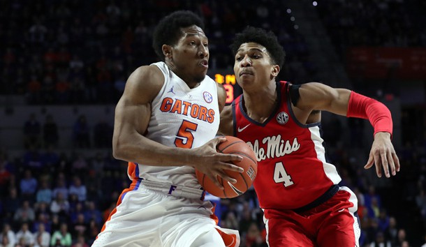 Jan 30, 2019; Gainesville, FL, USA; Florida Gators guard KeVaughn Allen (5) drives to the basket for a layup against Mississippi Rebels guard Breein Tyree (4) during overtime at Exactech Arena. Photo Credit: Kim Klement-USA TODAY Sports