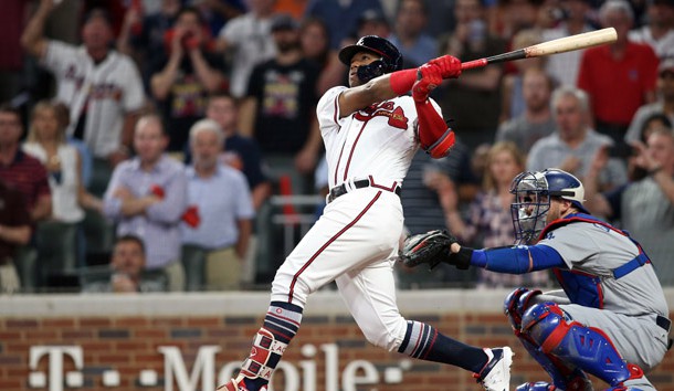 Oct 7, 2018; Atlanta, GA, USA; Atlanta Braves left fielder Ronald Acuna Jr. (13) hits a grand slam against the Los Angeles Dodgers during the second inning of game three of the 2018 NLDS playoff baseball series at SunTrust Park. Photo Credit: Brett Davis-USA TODAY Sports