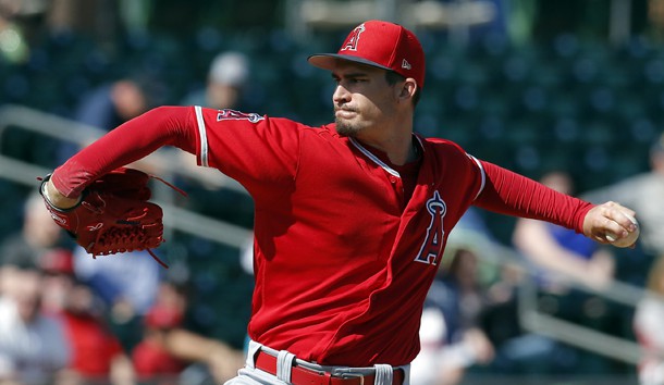 Feb 26, 2019; Mesa, AZ, USA; Los Angeles Angels starting pitcher Andrew Heaney (28) throws against the Oakland Athletics in the first inning during a spring training game at HoHoKam Stadium. Photo Credit: Rick Scuteri-USA TODAY Sports