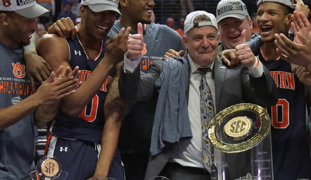 Mar 17, 2019; Nashville, TN, USA; Auburn Tigers head coach Bruce Pearl reacts with Auburn forward Horace Spencer (0) and his teammates as his hat is reversed by the team following the championship game between the Tennessee Volunteers and the Auburn Tigers in the SEC conference tournament at Bridgestone Arena. Auburn won 84-64. Photo Credit: Jim Brown-USA TODAY Sports