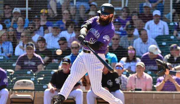Mar 5, 2019; Salt River Pima-Maricopa, AZ, USA; Colorado Rockies center fielder Charlie Blackmon (19) flies out in the first inning against the Milwaukee Brewers at Salt River Fields at Talking Stick. Photo Credit: Matt Kartozian-USA TODAY Sports