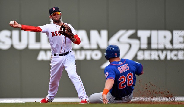 Mar 9, 2019; Fort Myers, FL, USA; Boston Red Sox second baseman Dustin Pedroia (15) turns a double play as New York Mets third baseman J.D. Davis (28) slides in during the second inning of the spring training game at JetBlue Park. Photo Credit: Jasen Vinlove-USA TODAY Sports