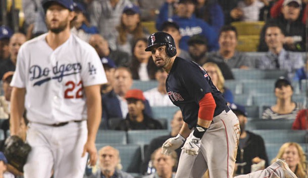 Oct 28, 2018; Los Angeles, CA, USA; Boston Red Sox outfielder J.D. Martinez (right) watches his solo home run off of Los Angeles Dodgers pitcher Clayton Kershaw (22) in the seventh inning in game five of the 2018 World Series at Dodger Stadium. Photo Credit: Robert Hanashiro-USA TODAY Sports