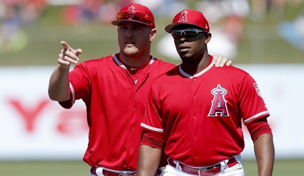 Mar 22, 2019; Tempe, AZ, USA; Los Angeles Angels center fielder Mike Trout (27) and Justin Upton (8) before a spring training game against the Chicago White Sox at Tempe Diablo Stadium. Photo Credit: Rick Scuteri-USA TODAY Sports