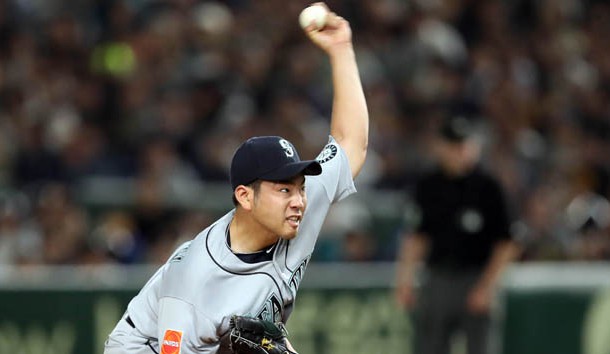 Mar 21, 2019; Tokyo,JPN; Seattle Mariners starting pitcher Yusei Kikuchi (18) throws a pitch during the fifth inning against the Oakland Athletics at Tokyo Dome. Photo Credit: Darren Yamashita-USA TODAY Sports