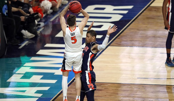 Apr 6, 2019; Minneapolis, MN, USA; Virginia Cavaliers guard Kyle Guy (5) is fouled by Auburn Tigers guard Samir Doughty (10) during the second half in the semifinals of the 2019 men's Final Four at US Bank Stadium. Photo Credit: Brace Hemmelgarn-USA TODAY Sports