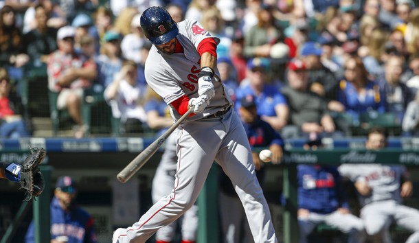 Mar 31, 2019; Seattle, WA, USA; Boston Red Sox left fielder J.D. Martinez (28) hits an RBI single against the Seattle Mariners during the first inning at T-Mobile Park. Photo Credit: Jennifer Buchanan-USA TODAY Sports