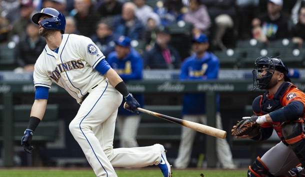 Apr 14, 2019; Seattle, WA, USA; Seattle Mariners center fielder Mitch Haniger (17) hits a solo home run in the first inning against the Houston Astros at T-Mobile Park. Photo Credit: Lindsey Wasson-USA TODAY Sports