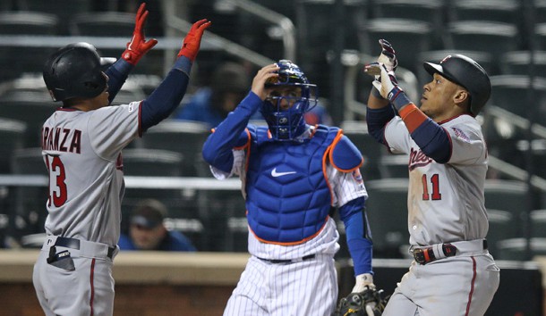 Apr 9, 2019; New York City, NY, USA; Minnesota Twins shortstop Jorge Polanco (11) celebrates his two run home run with shortstop Ehire Adrianza (13) in front of New York Mets catcher Travis d'Arnaud (18) during the eighth inning at Citi Field. Photo Credit: Brad Penner-USA TODAY Sports