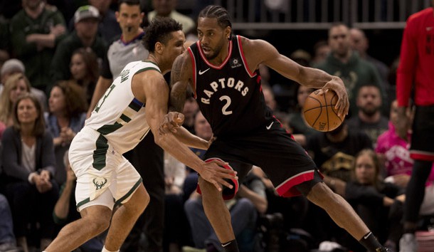 May 15, 2019; Milwaukee, WI, USA; Toronto Raptors forward Kawhi Leonard (2) drives for the basket against Milwaukee Bucks guard Malcolm Brogdon (13) during the fourth quarter in game one of the Eastern conference finals of the 2019 NBA Playoffs at Fiserv Forum. Photo Credit: Jeff Hanisch-USA TODAY Sports