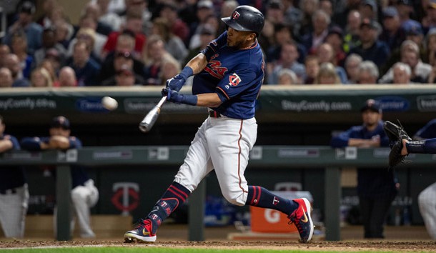 May 28, 2019; Minneapolis, MN, USA; Minnesota Twins right fielder Eddie Rosario (20) hits a two-run home run during the seventh inning against the Milwaukee Brewers at Target Field. Photo Credit: Jordan Johnson-USA TODAY Sports
